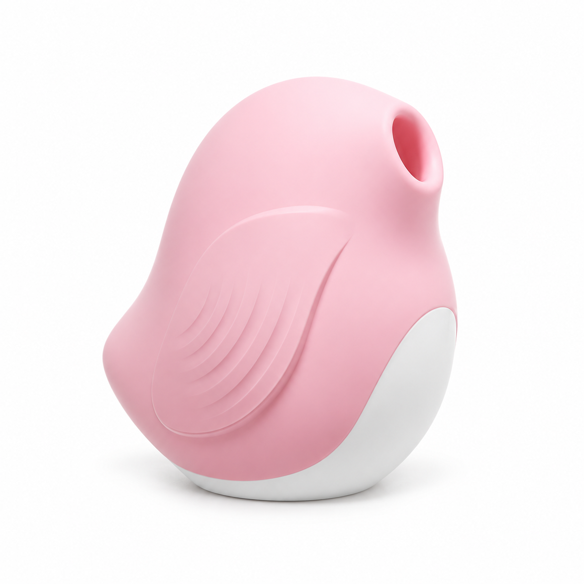 Sakura Finch Suction Massager in cherry blossom pink, angled view of the rounded body